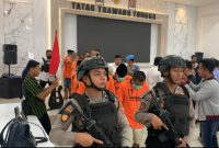 Pelaku saat diringkus Polisi.