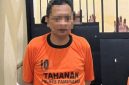 Pelaku saat dibekuk polisi.