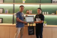 Ketua JMP (kiri) dan Ketua PWI Pamekasan (kanan).