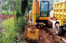Aktivitas alat berat saat sabotase tanah warga di bulangan barat.